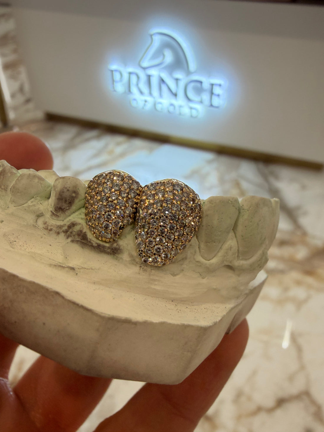 Iced out 2 teeth Grillz